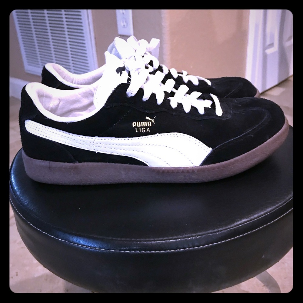 Black and white Puma sneakers